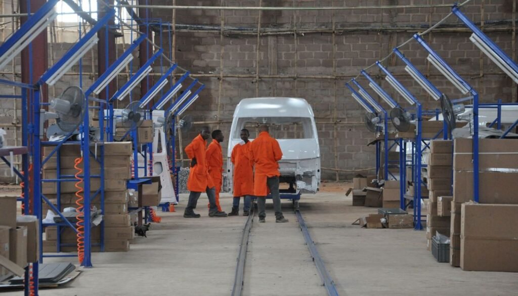 Workers on the final assembly line at the Nigeria plant