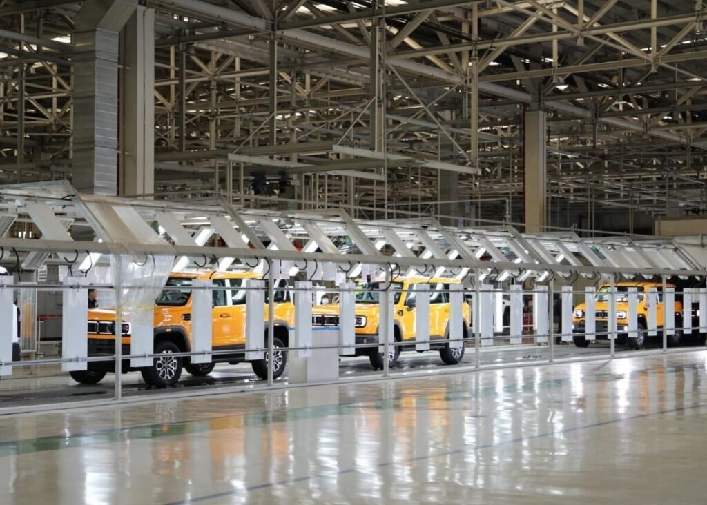 Vehicle production line with robotic stations